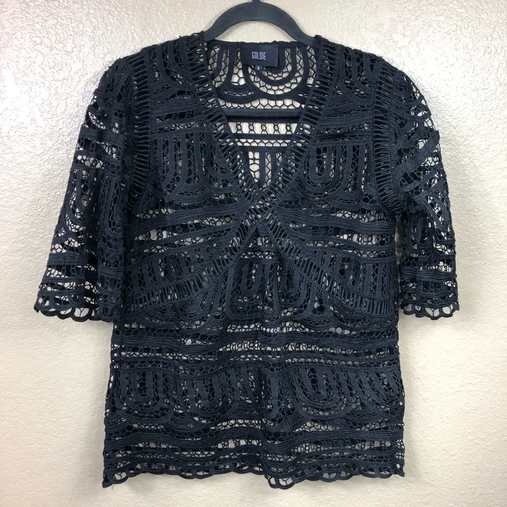 Goldie crocheted lace v neck flare sleeve top.